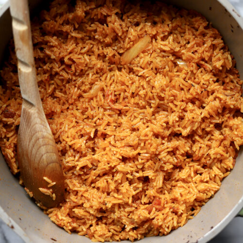 Jollof Rice and Chicken with Coleslaw - Travelandmunchies